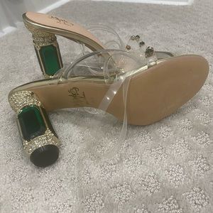 Monez lace up sandals with jeweled heel.